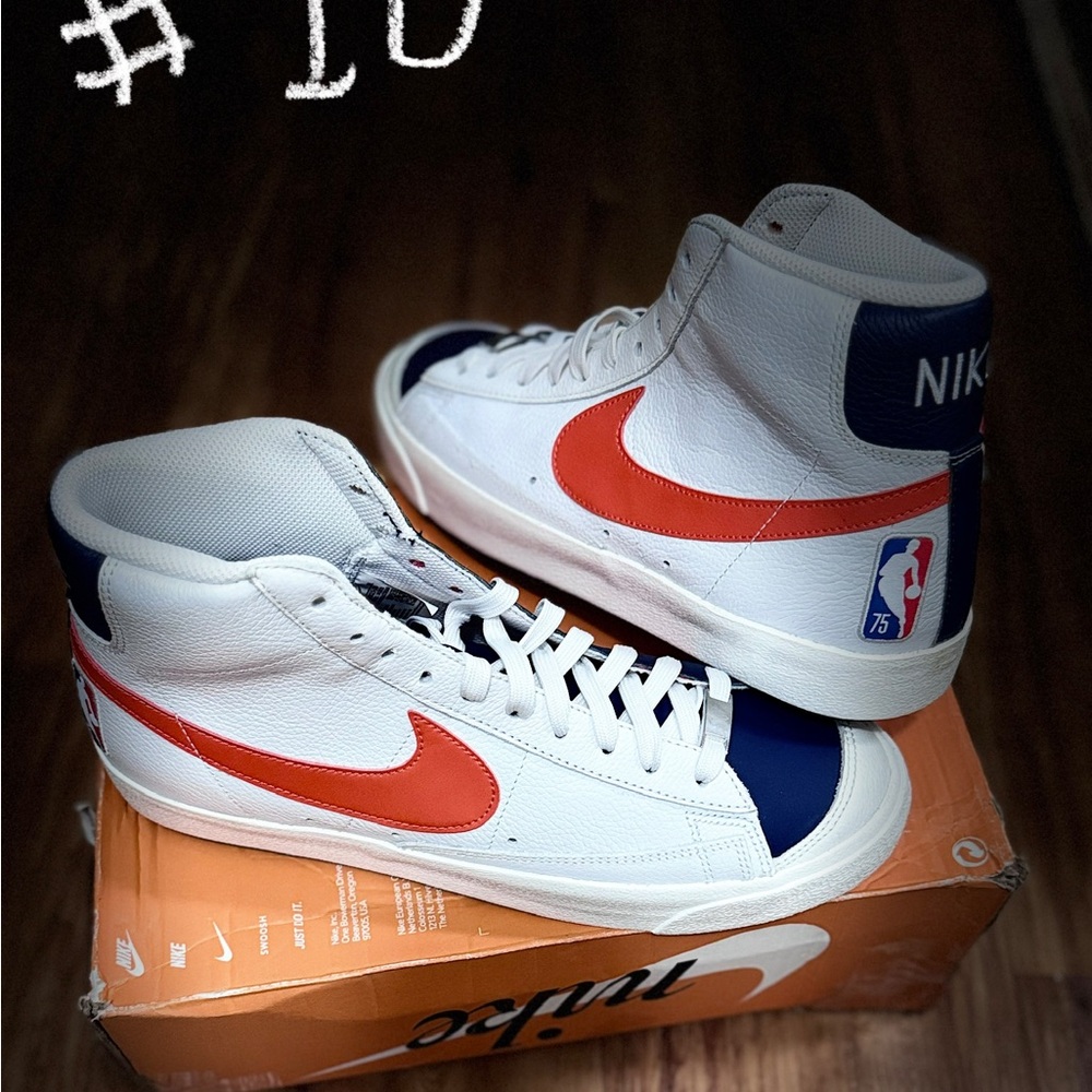 Nike White High-Top Sneakers with Orange Swoosh and Navy Accents
